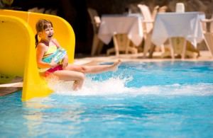 Girl Sliding in pool